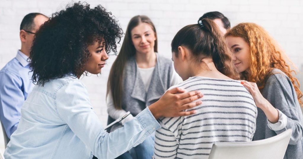 Group of people in addiction recovery support after receiving NAD+ therapy treatment at Hydrate Medical in Charlotte North Carolina